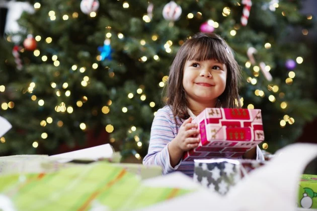 Child with Christmas present Child with Christmas present